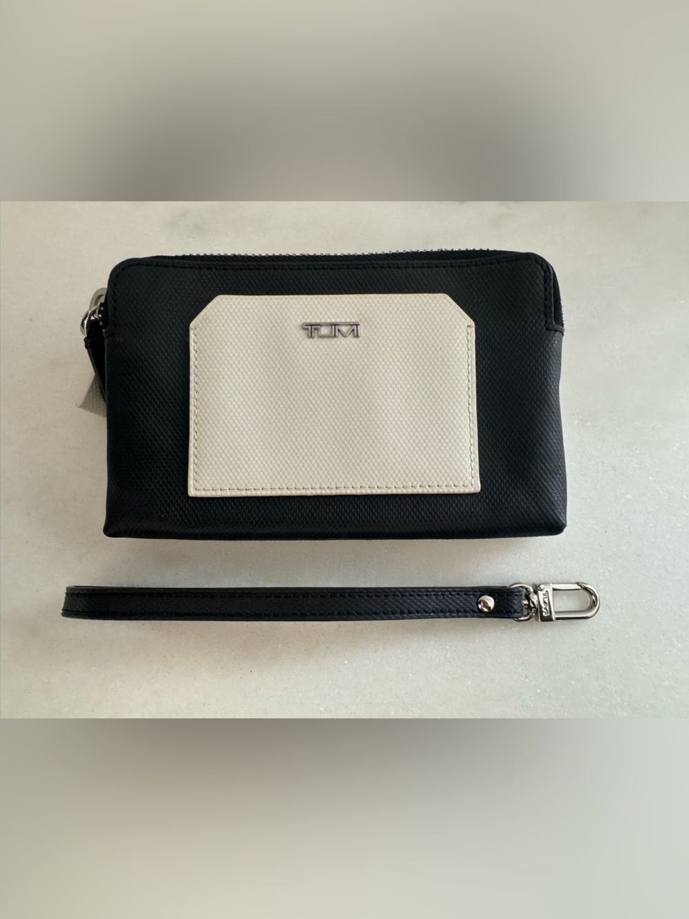 TUMI Black with White Accent Wristlet Pouch